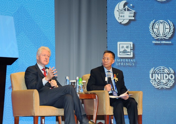 全球中小企业联盟执行主席王家卓与克林顿对话
